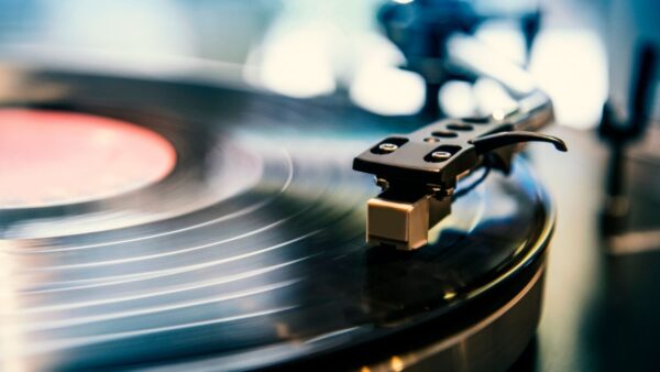 A vinyl record being played by needle