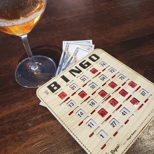 Bingo card and glass of wine