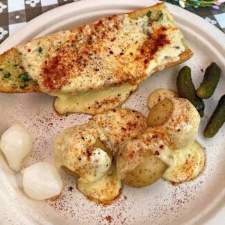 raclette on bread and potatoes